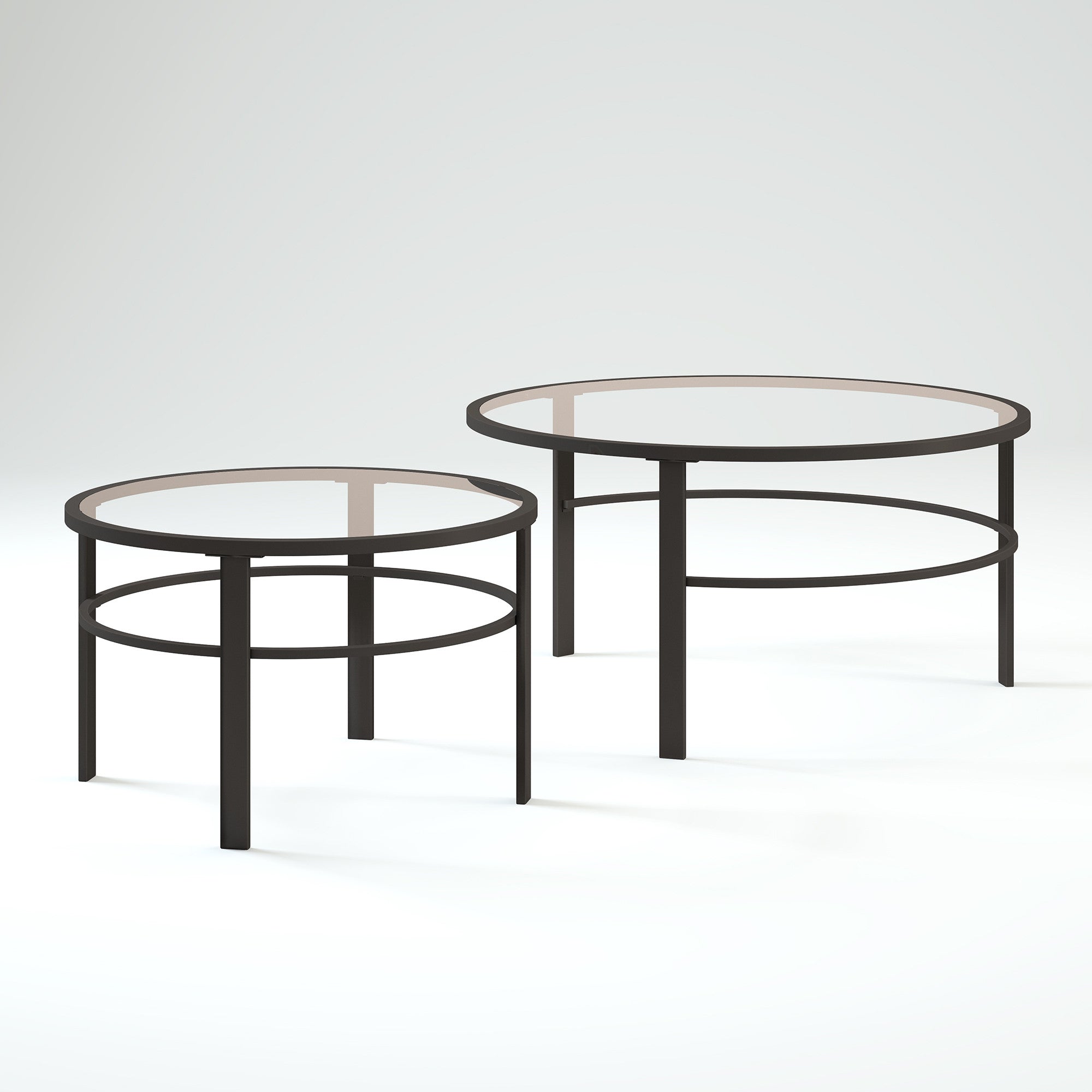 Set of Two 36 Clear And Black Glass And Steel Round Nested Coffee Tables